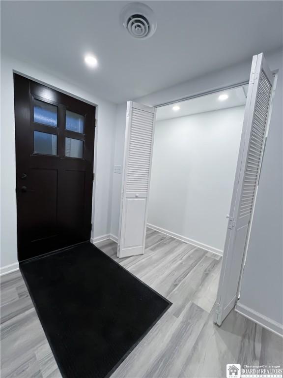 5417 Rte 5, Portland, NY 14769 - foyer entrance with baseboards, light wood finished floors, and recessed lighting