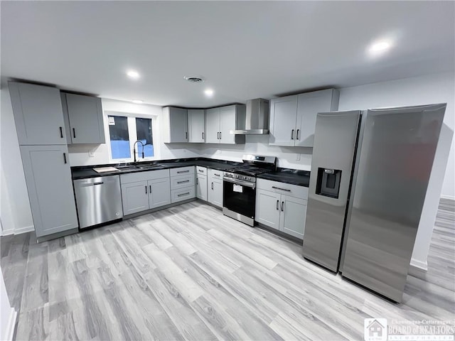 5417 Rte 5, Portland, NY 14769 - kitchen with appliances with stainless steel finishes, a sink, wall chimney range hood, dark countertops, and recessed lighting