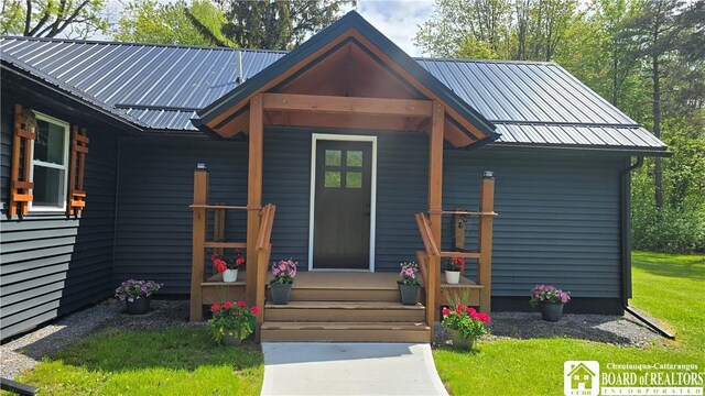 5417 Rte 5, Portland, NY 14769 - view of exterior entry featuring metal roof