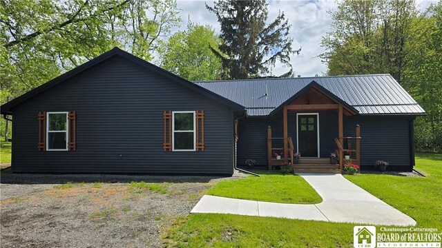 5417 Rte 5, Portland, NY 14769 - view of front of property featuring a front yard, metal roof, and a porch