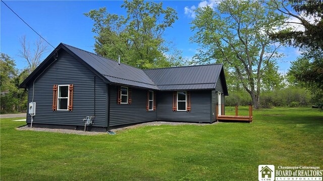 5417 Rte 5, Portland, NY 14769 - view of side of property with a lawn and metal roof