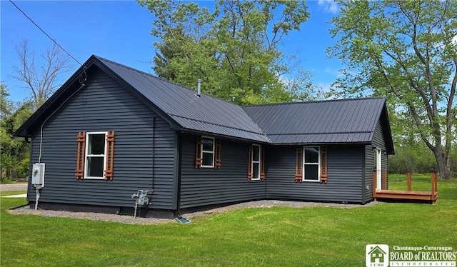 5417 Rte 5, Portland, NY 14769 - view of home's exterior with a lawn and metal roof