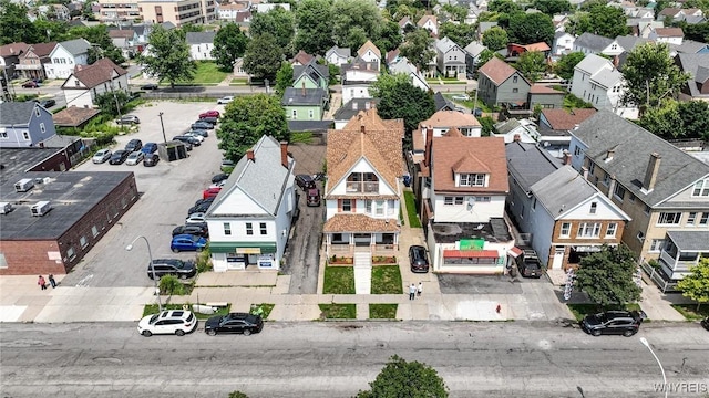 birds eye view of property with a residential view