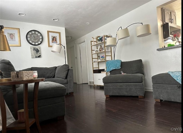 living area featuring dark wood-type flooring