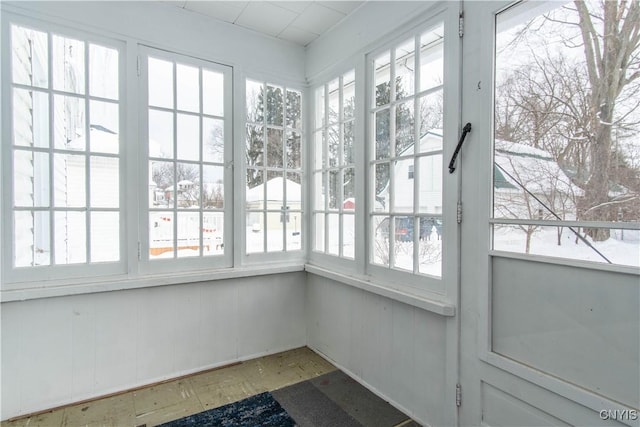 sunroom / solarium featuring a wealth of natural light