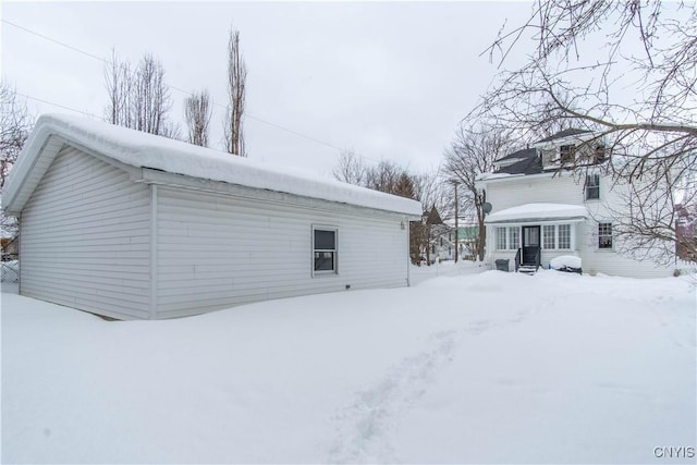 view of snow covered property