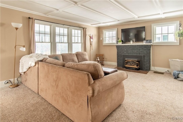 carpeted living area with plenty of natural light, baseboards, and coffered ceiling