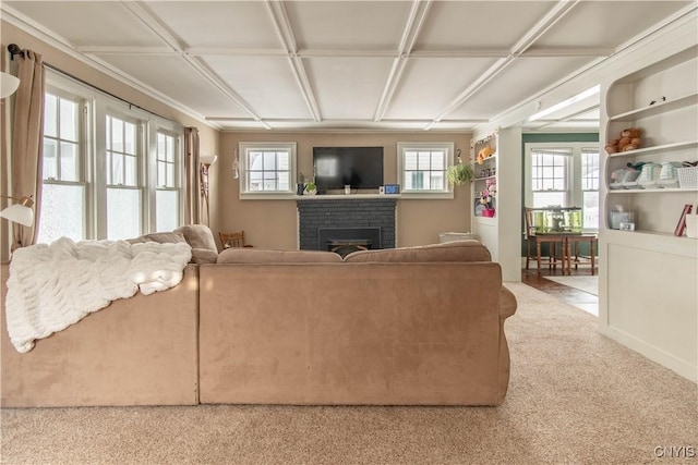 living room featuring light colored carpet and a fireplace