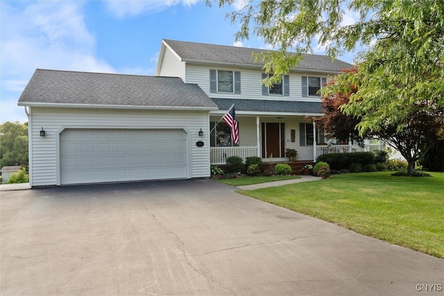 traditional-style home featuring a porch, a garage, a shingled roof, driveway, and a front lawn