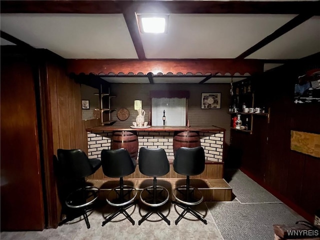 bar with a dry bar and wooden walls