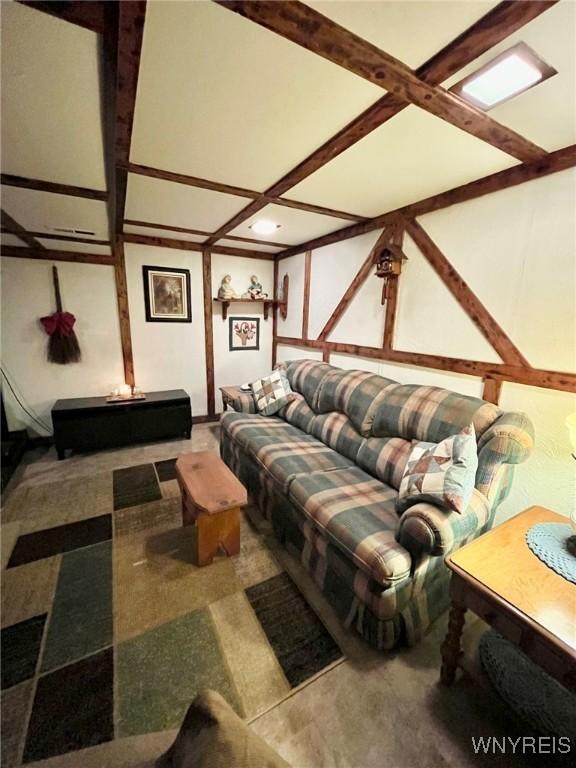 living room with coffered ceiling