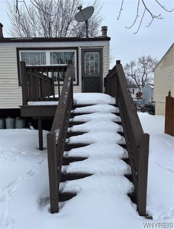 view of snow covered deck