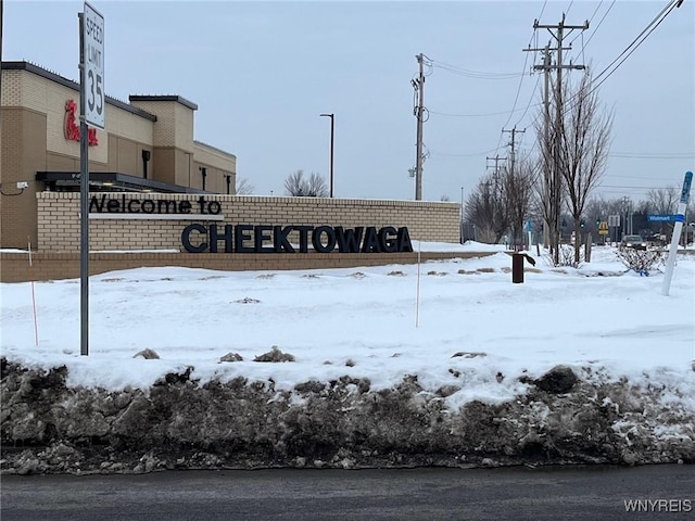 view of community sign