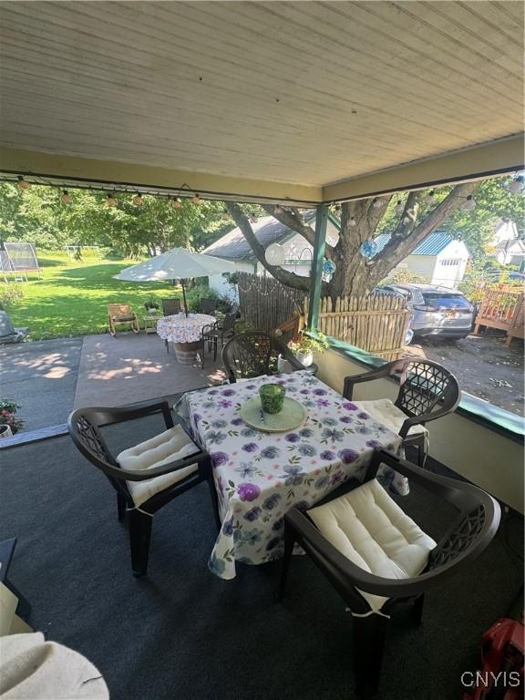 view of patio / terrace with fence and outdoor dining space