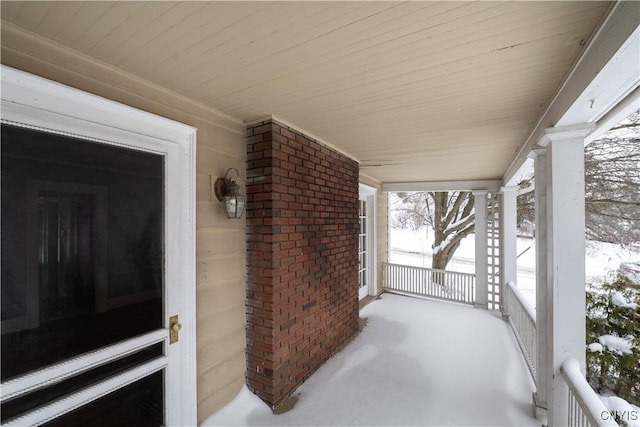 view of snow covered patio