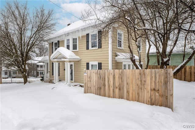 view of front of house with fence