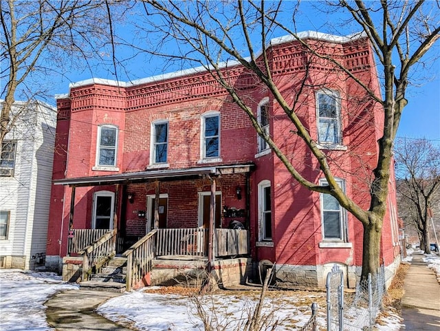 view of front of house with brick siding