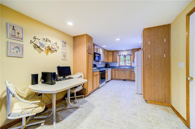 kitchen with white appliances, a sink, baseboards, brown cabinetry, and dark countertops