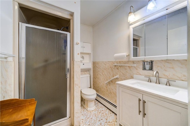 bathroom with a baseboard radiator, a stall shower, wainscoting, vanity, and tile patterned floors