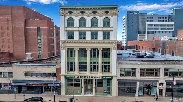 view of building exterior featuring a city view