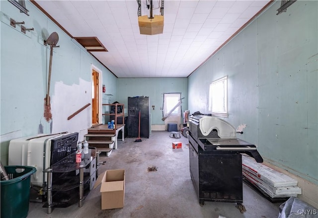 misc room featuring unfinished concrete flooring