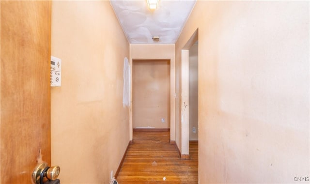 hall with light wood-type flooring