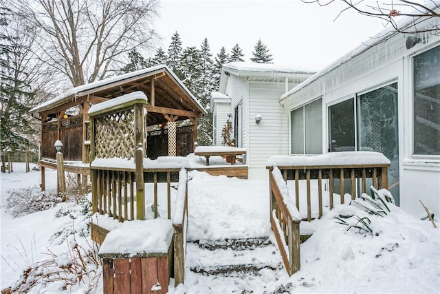 view of snow covered deck