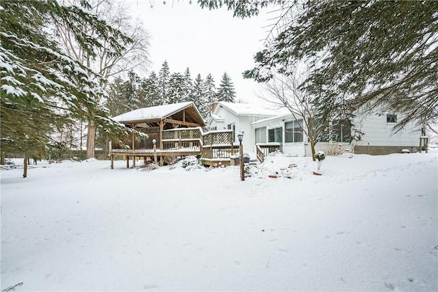 view of front of house featuring a wooden deck