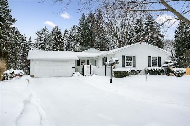 ranch-style home with an attached garage