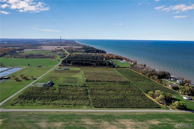 drone / aerial view with a water view and a rural view