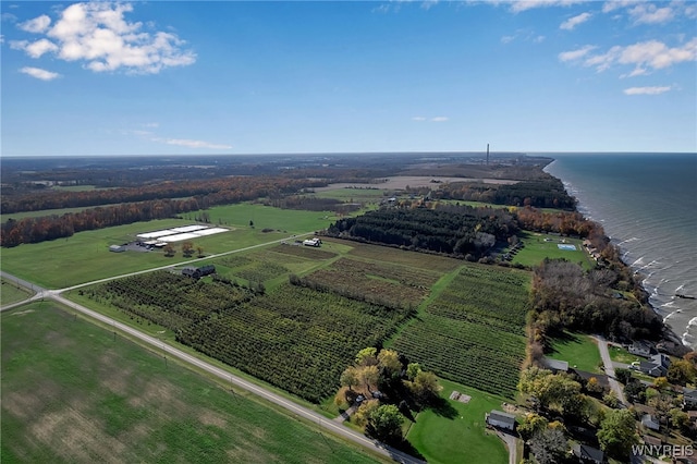 birds eye view of property with a water view and a rural view