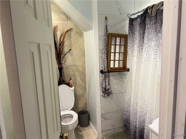 full bath featuring toilet, tile walls, and a shower with curtain