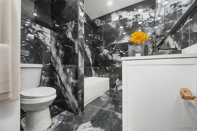 full bath with marble finish floor and toilet