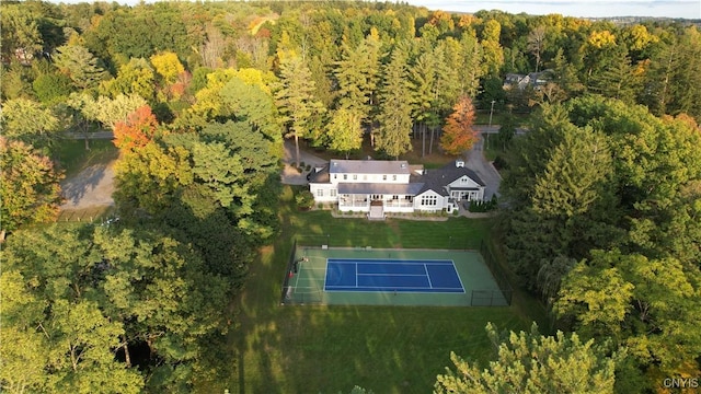 drone / aerial view with a view of trees