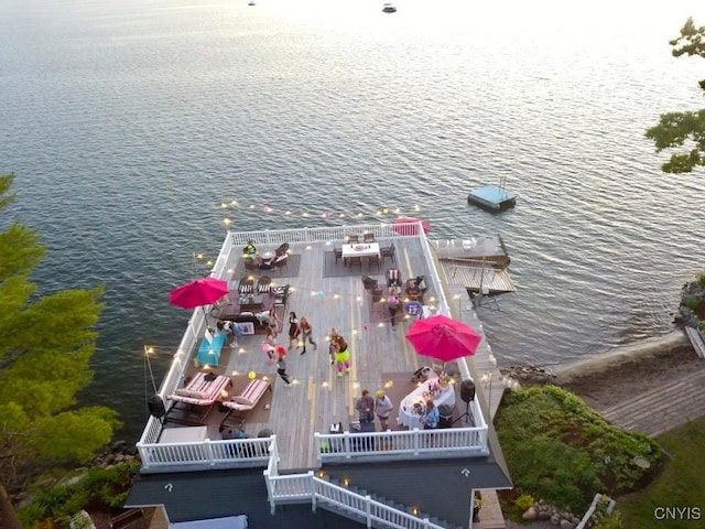 birds eye view of property featuring a water view