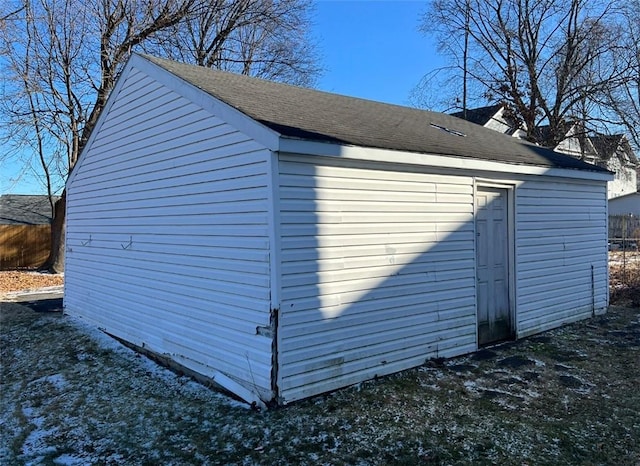 view of outdoor structure featuring fence
