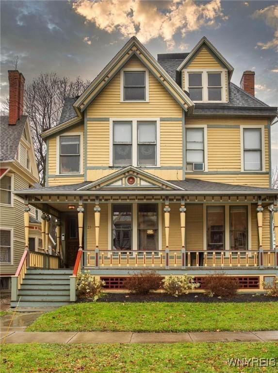 victorian home featuring covered porch