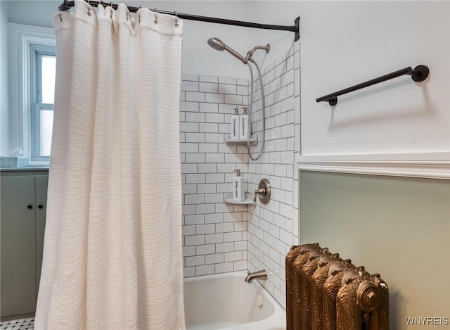 bathroom with shower / bath combination with curtain