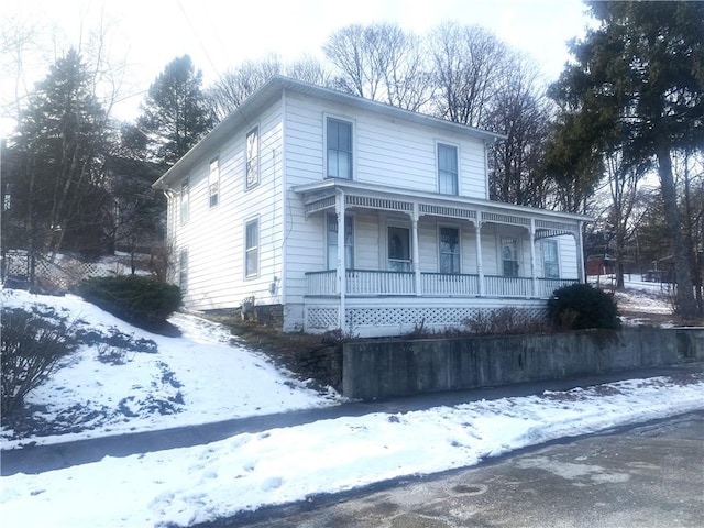 view of front of house featuring covered porch