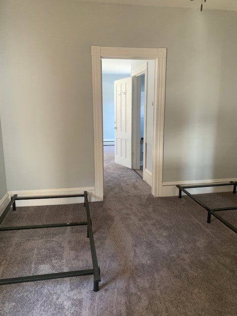 stairway featuring carpet