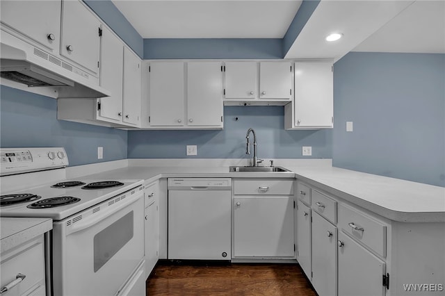 kitchen with light countertops, white cabinetry, a sink, white appliances, and under cabinet range hood