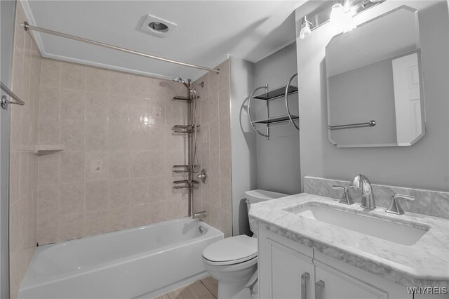 full bath with toilet, shower / tub combination, and vanity