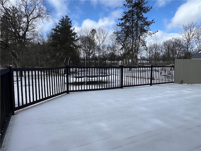 view of snow covered gate