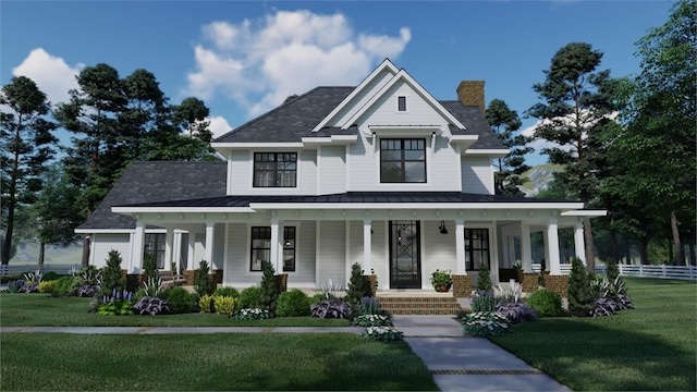 view of front of home with metal roof, covered porch, a front yard, a standing seam roof, and a chimney