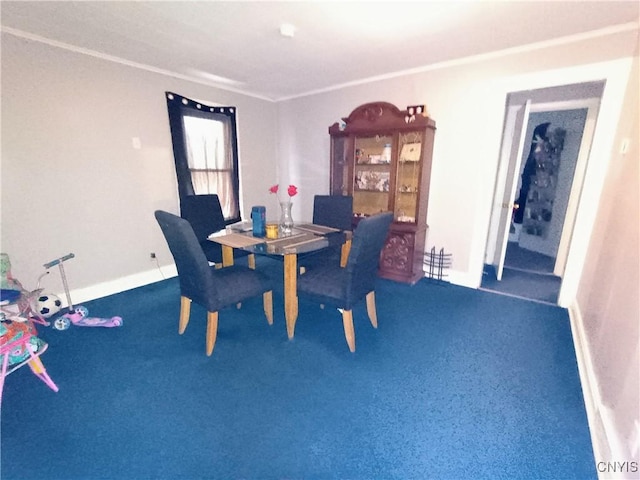 dining area with crown molding, dark colored carpet, and baseboards