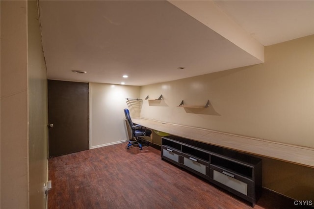 office with wood finished floors and recessed lighting