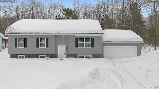 raised ranch featuring a garage