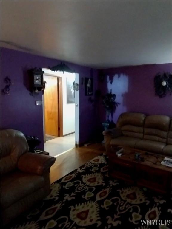 living room with wood finished floors