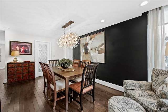 dining room with recessed lighting, a notable chandelier, dark wood finished floors, and baseboards