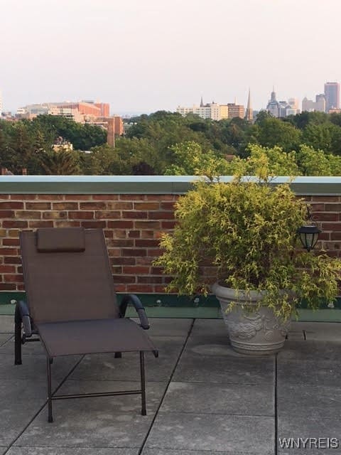 view of patio featuring a view of city